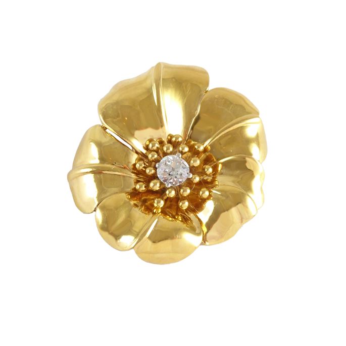 Gold and diamond flowerhead brooch by Cartier, Paris  in the form of a stylised hibiscus, | MasterArt